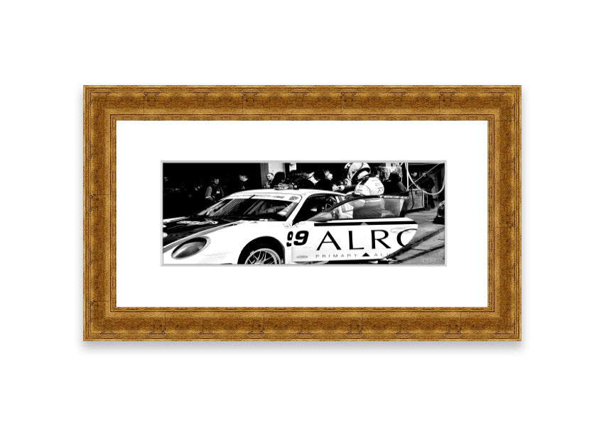 Framed print of Arton Senna preparing for a race, showcasing vibrant colors and detailed craftsmanship.