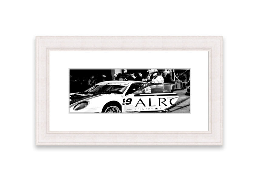 Framed print of Arton Senna preparing for a race, showcasing vibrant colors and detailed craftsmanship.