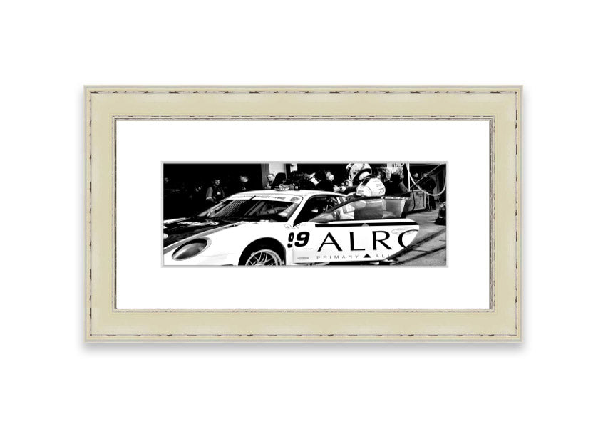 Framed print of Arton Senna preparing for a race, showcasing vibrant colors and detailed craftsmanship.