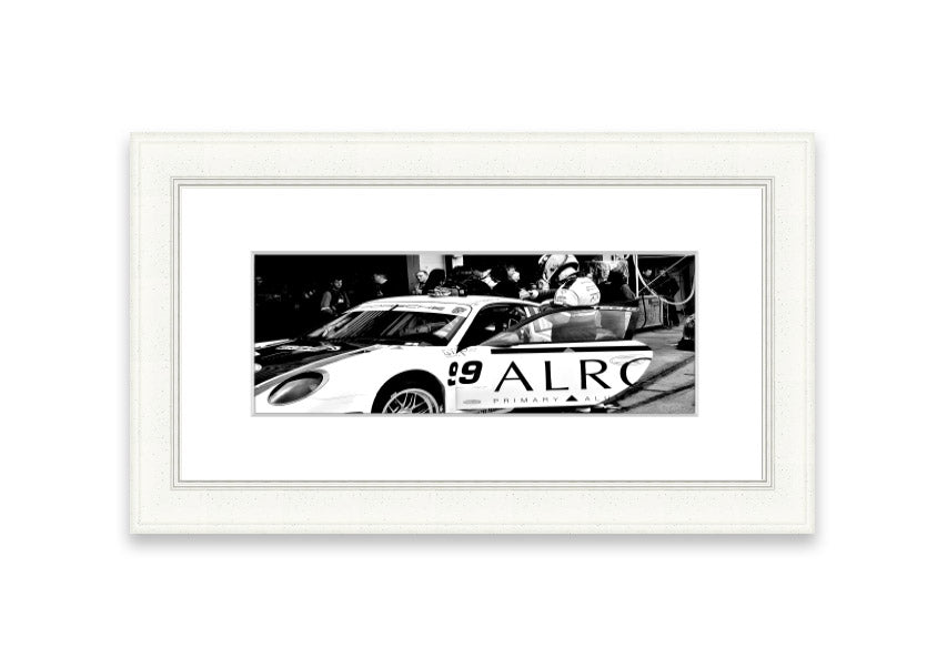 Framed print of Arton Senna preparing for a race, showcasing vibrant colors and detailed craftsmanship.