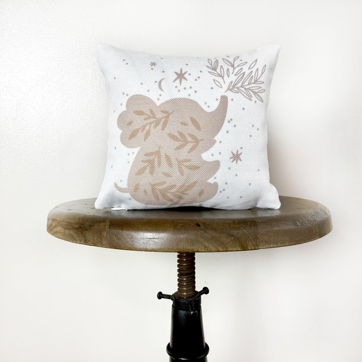 A cute baby elephant throw pillow cover featuring a playful design, perfect for nursery decor and baby showers.