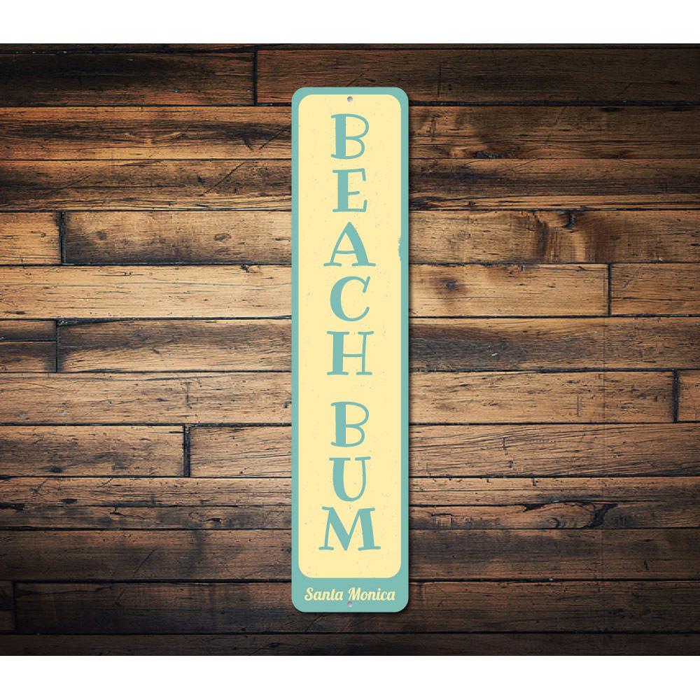 Beach Bum Vertical Sign made of aluminum, featuring vibrant colors and a beach-themed design, perfect for home decor.