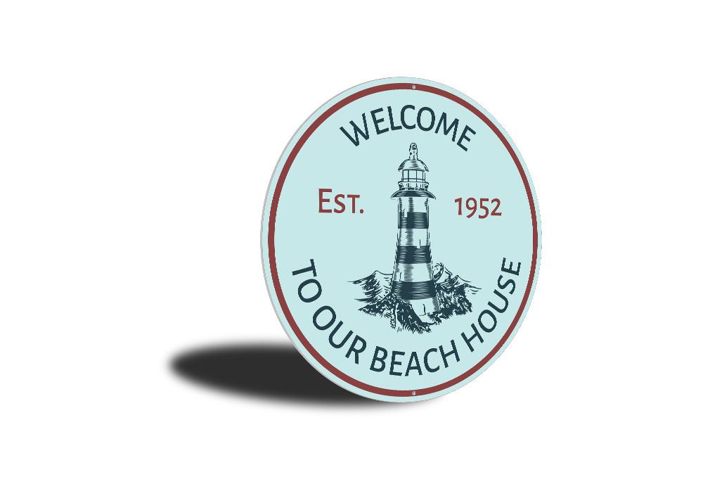 Beach House Lighthouse Sign made of durable aluminum, featuring a coastal design perfect for beach houses and seaside decor.