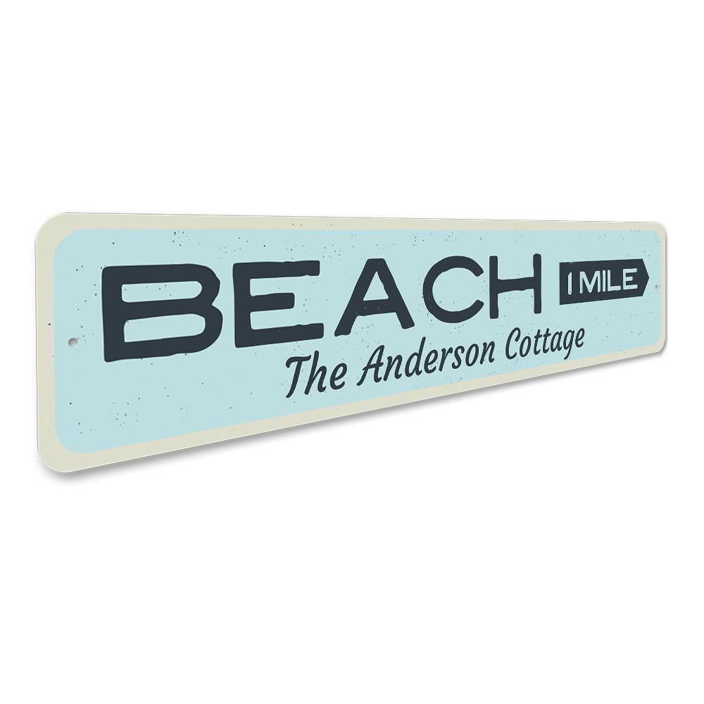 Beach Mileage Arrow Sign made of durable aluminum, featuring customizable text and pre-drilled holes for easy mounting.