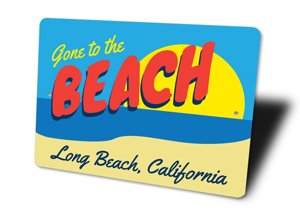 A decorative Beach Scene Sign featuring vibrant coastal imagery, perfect for home decor.
