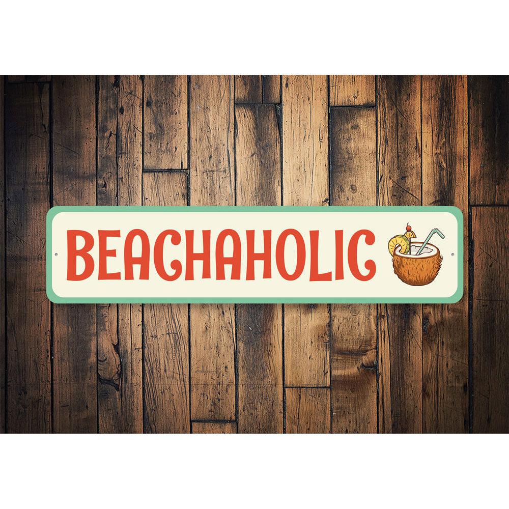 A stylish Beachaholic metal sign featuring vibrant colors and beach-themed design, perfect for home decor.