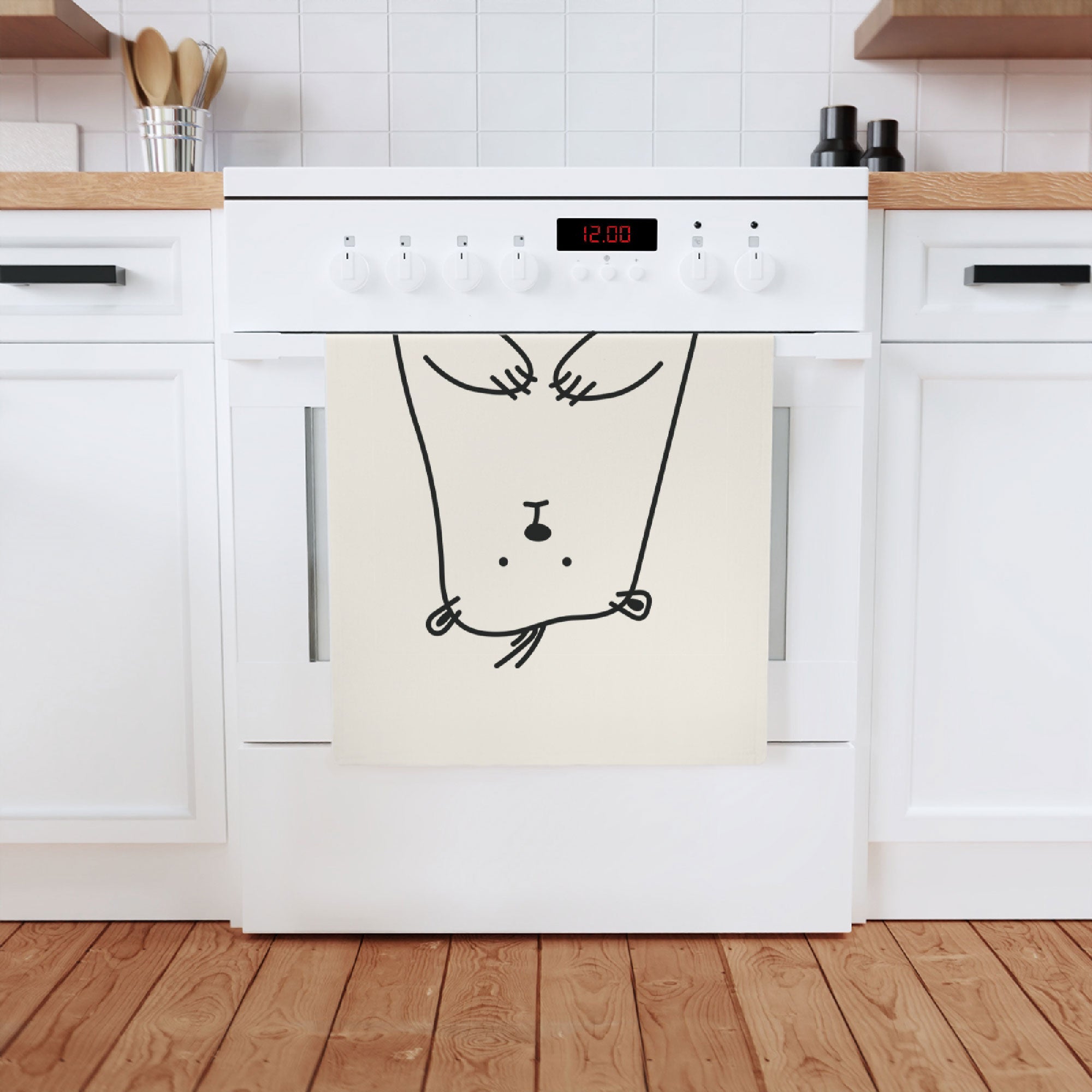 A cute bear cotton tea towel measuring 50 x 70 cm, made from 100% organic cotton, featuring a charming bear print.