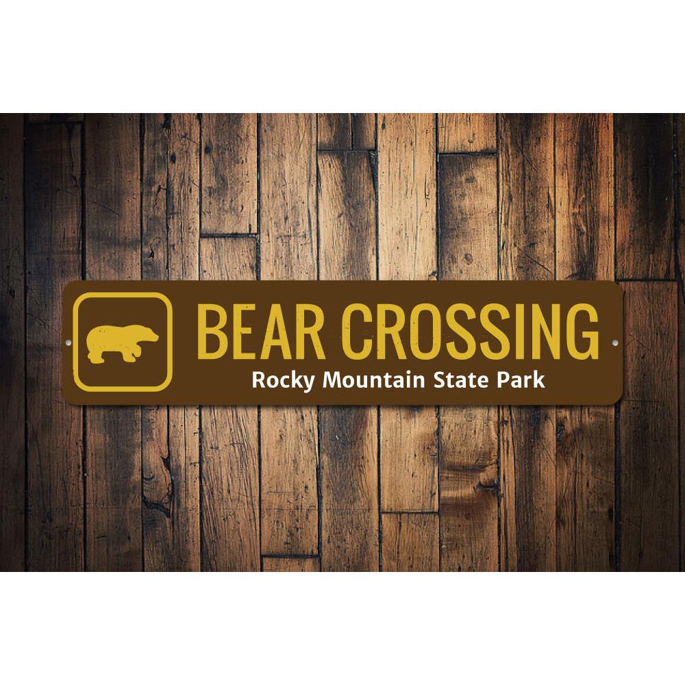 Bear Crossing Trail Sign made of high-quality aluminum, featuring a rustic design suitable for indoor and outdoor decor.