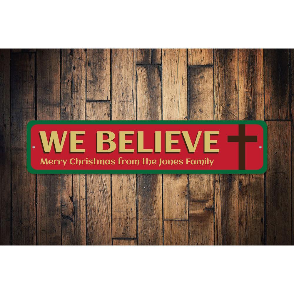 Believe Cross Sign featuring a festive design, made of high-quality aluminum, perfect for holiday decorations.