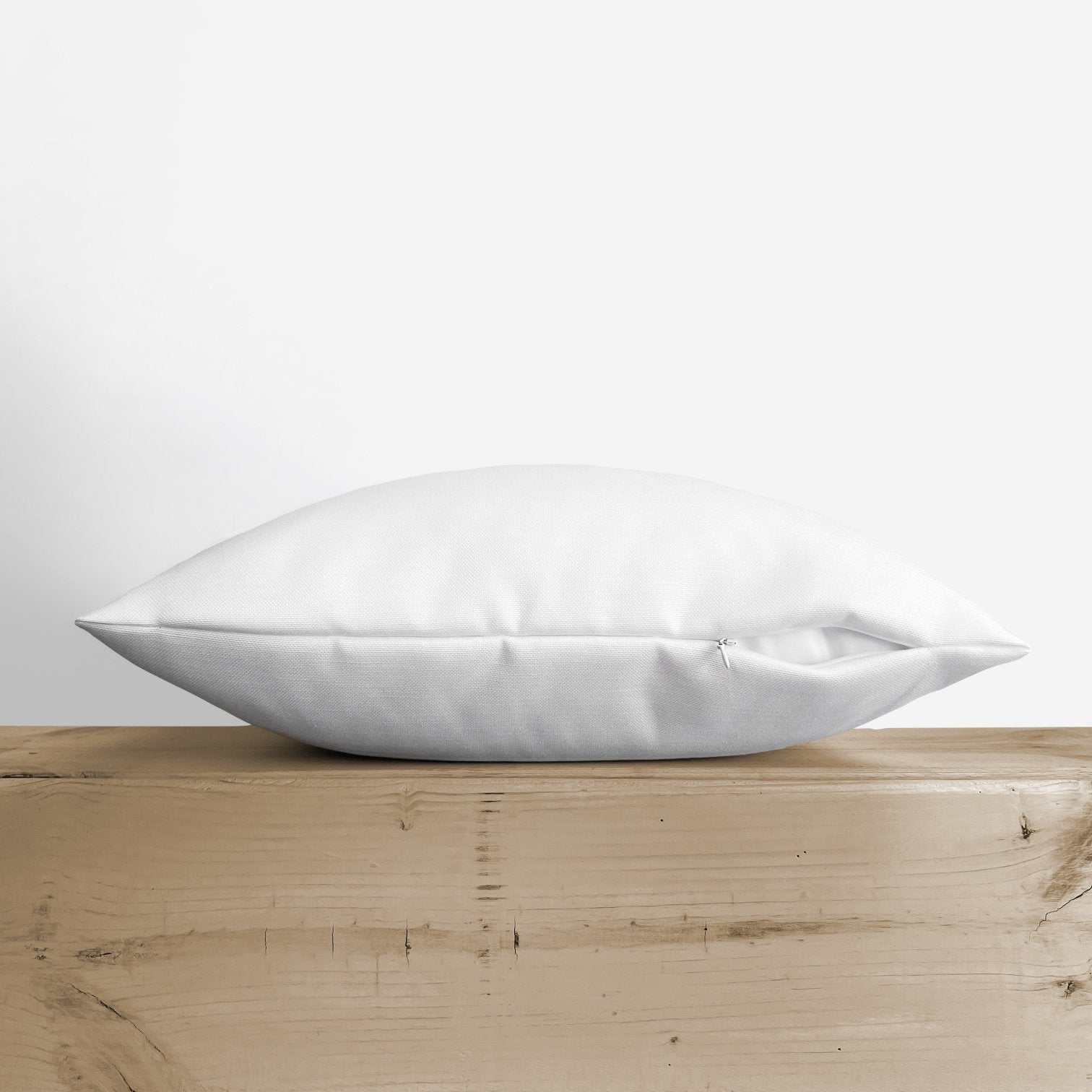 Believe with Berry Wreath Christmas Throw Pillow featuring red text and holly berry wreath on a white background, perfect for holiday decor.