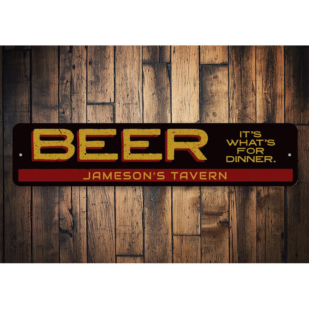 A humorous decorative sign reading 'Beer It's What's For Dinner', made of aluminum, suitable for kitchens and man caves.