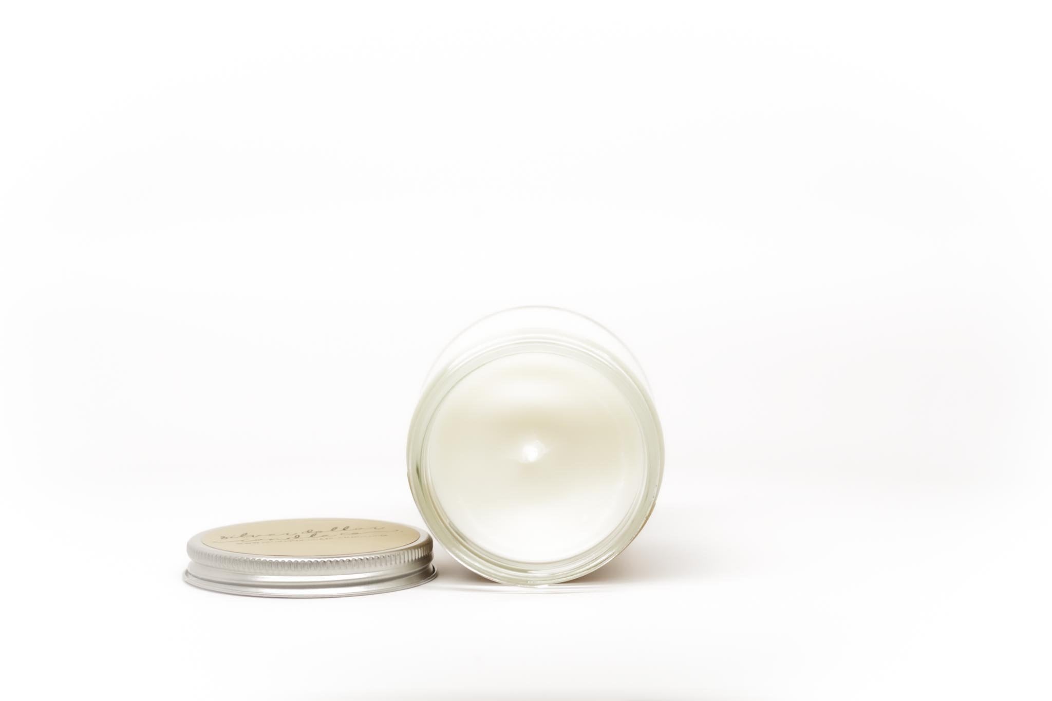 A beautifully crafted 'Best Dad Ever' scented candle in a stylish box, showcasing its natural soy wax and personalized lid.