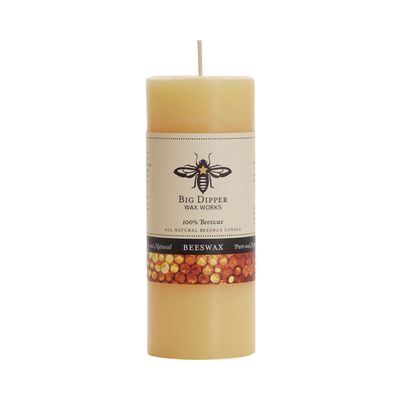 Big Dipper Wax Works All Hallows Eve Beeswax Pillars in natural and ivory colors, showcasing their elegant design and warm glow.