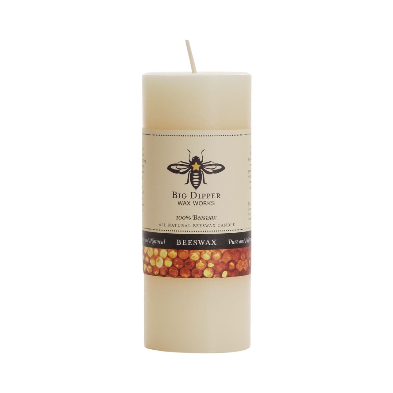 Big Dipper Wax Works All Hallows Eve Beeswax Pillars in natural and ivory colors, showcasing their elegant design and warm glow.