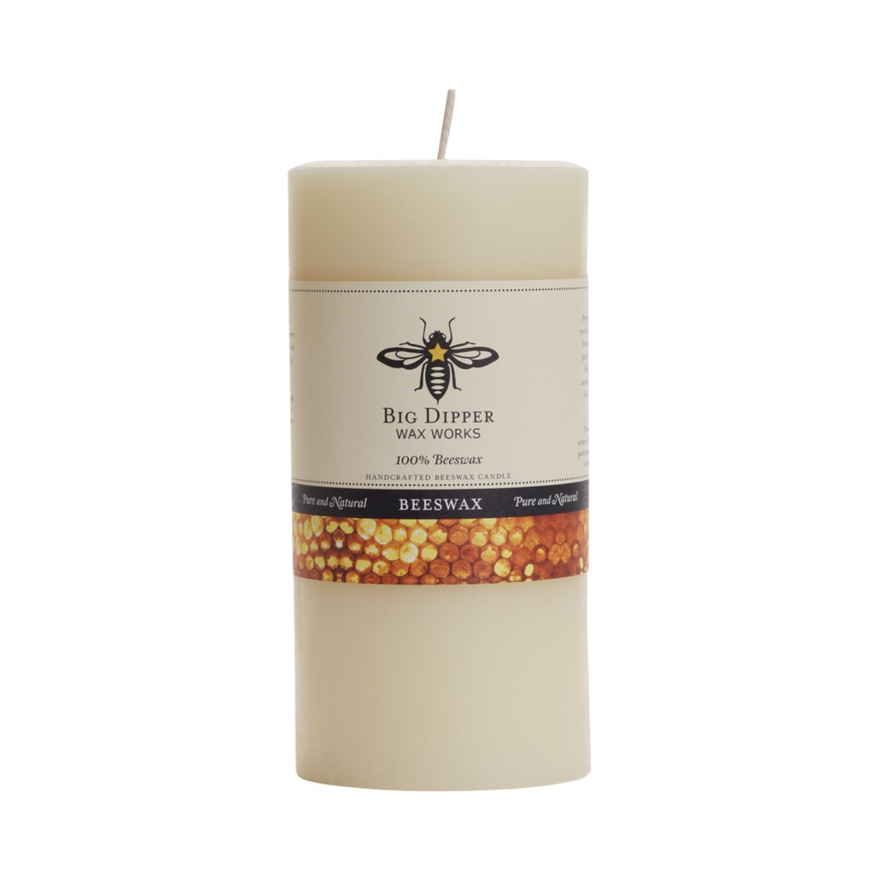 Big Dipper Wax Works All Hallows Eve Beeswax Pillars in natural and ivory colors, showcasing their elegant design and warm glow.