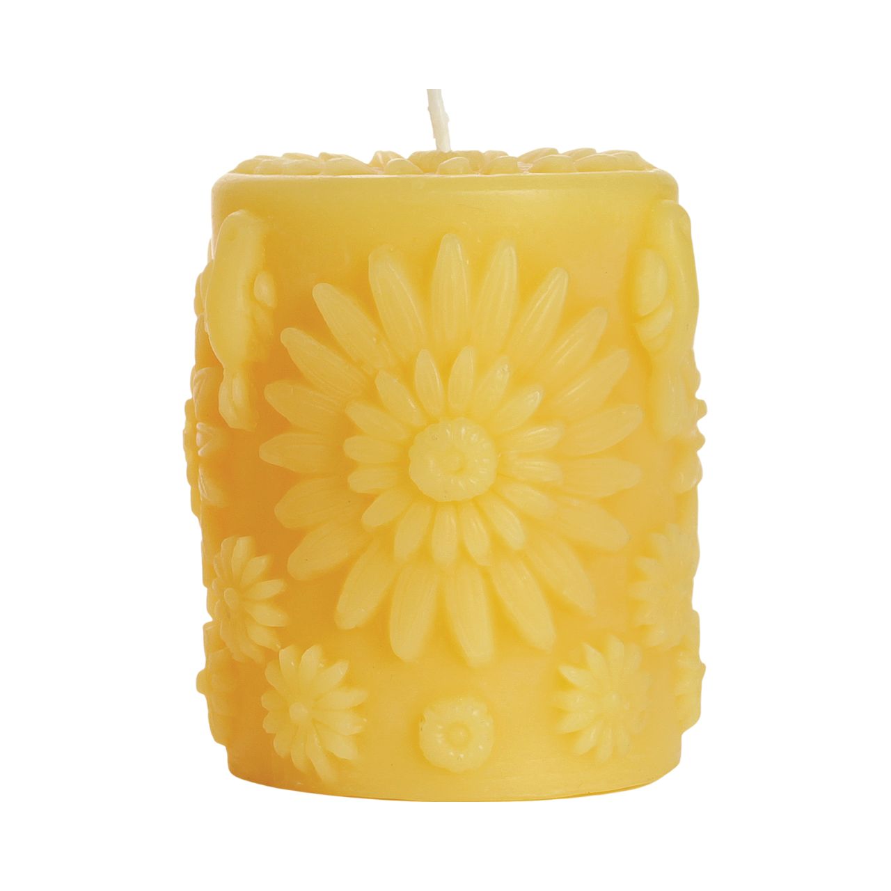 Big Dipper Wax Works Beeswax Floral Pillar candle with intricate floral design, glowing softly.