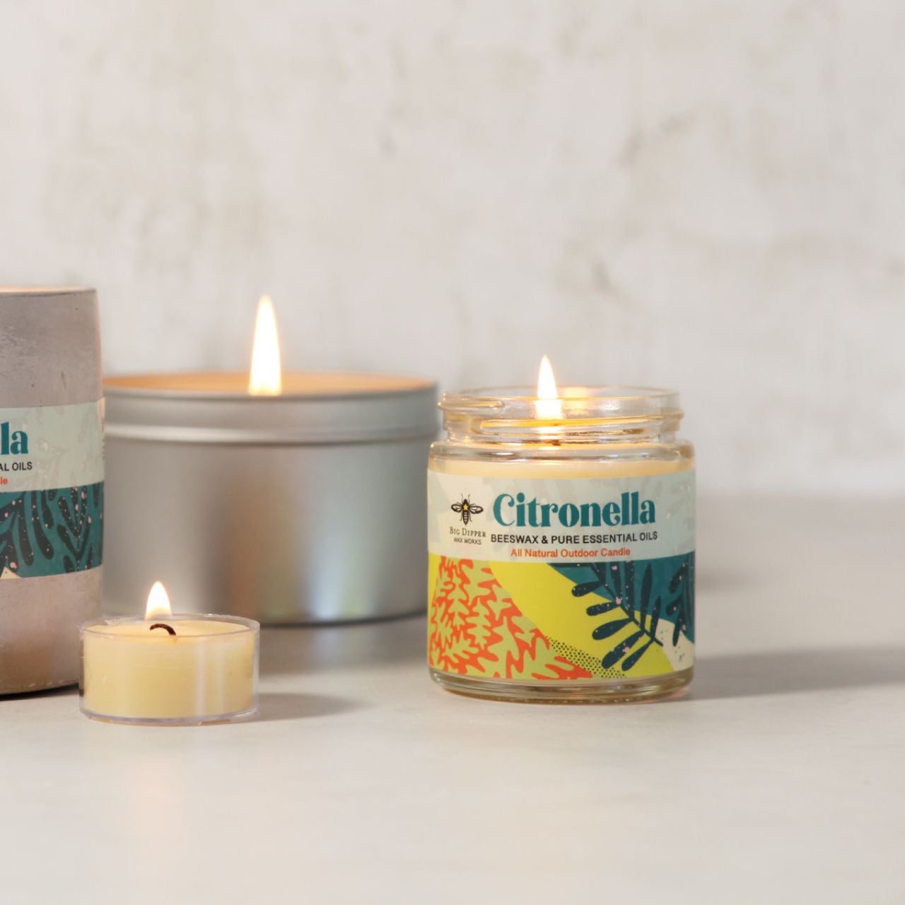 Big Dipper Wax Works Citronella Apothecary Glass candle in a sturdy glass container with a screw-top lid, featuring natural essential oils.