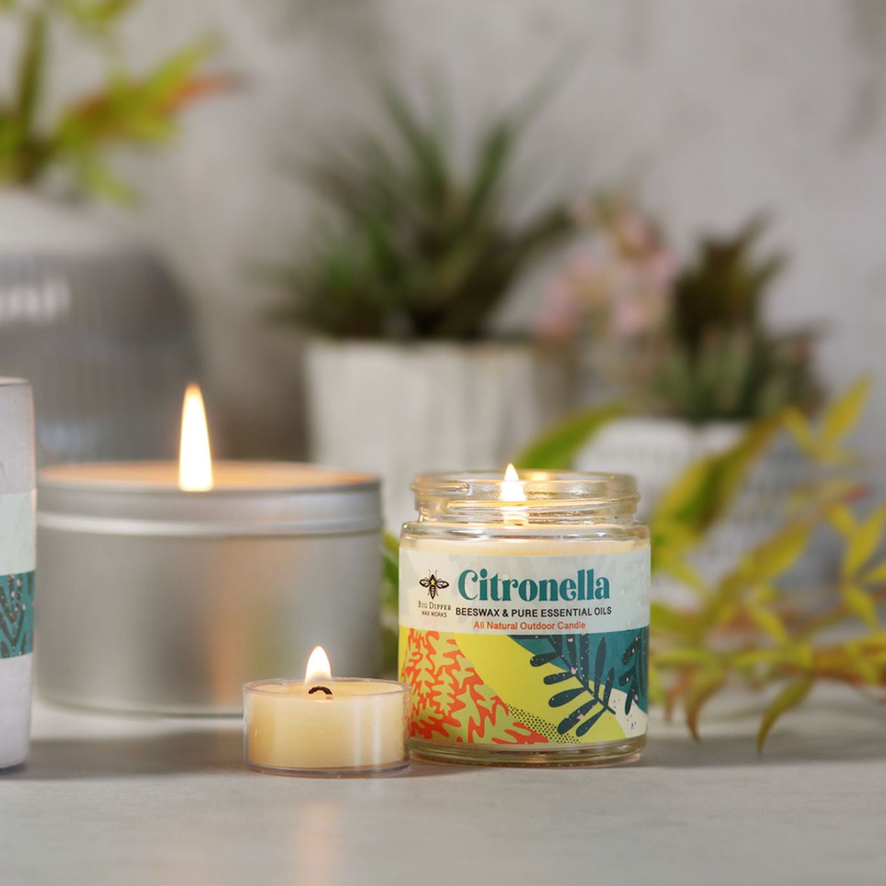 Big Dipper Wax Works Citronella Apothecary Glass candle in a sturdy glass container with a screw-top lid, featuring natural essential oils.