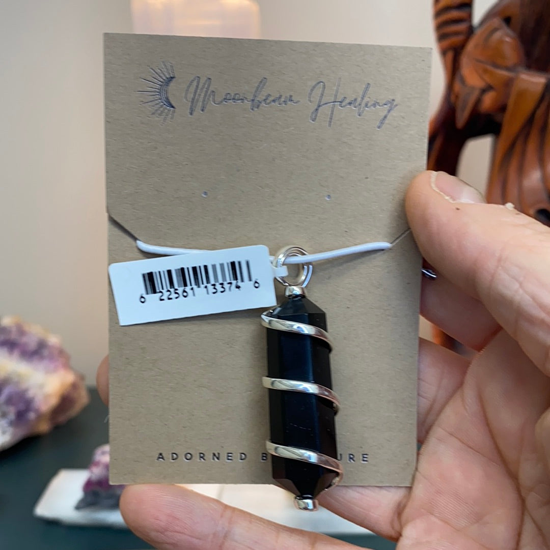Black Obsidian Silver Wrapped Double Terminated Point Pendant showcasing unique crystal design and sterling silver wrapping.