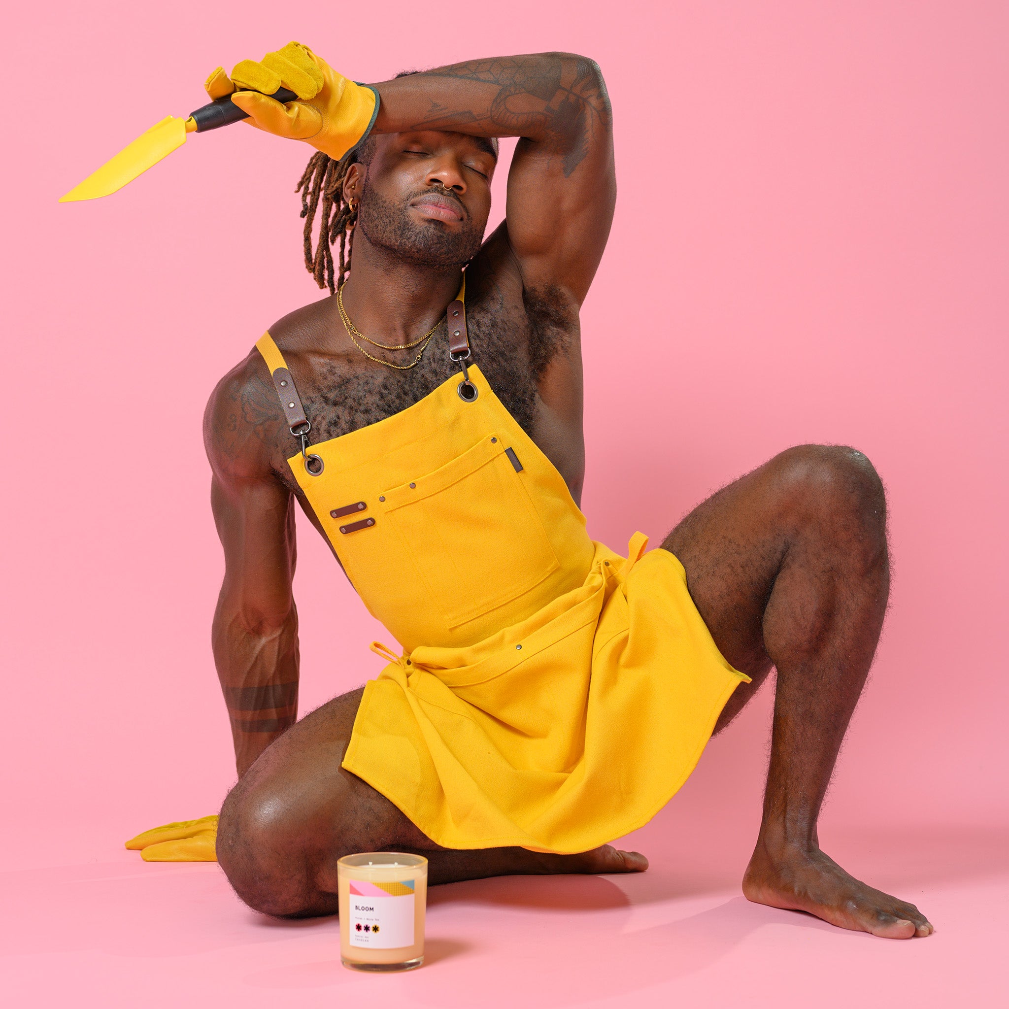 Bloom, Violet + White Tea 11oz Candle in a reusable jar with floral design, showcasing its eco-friendly and elegant appeal.