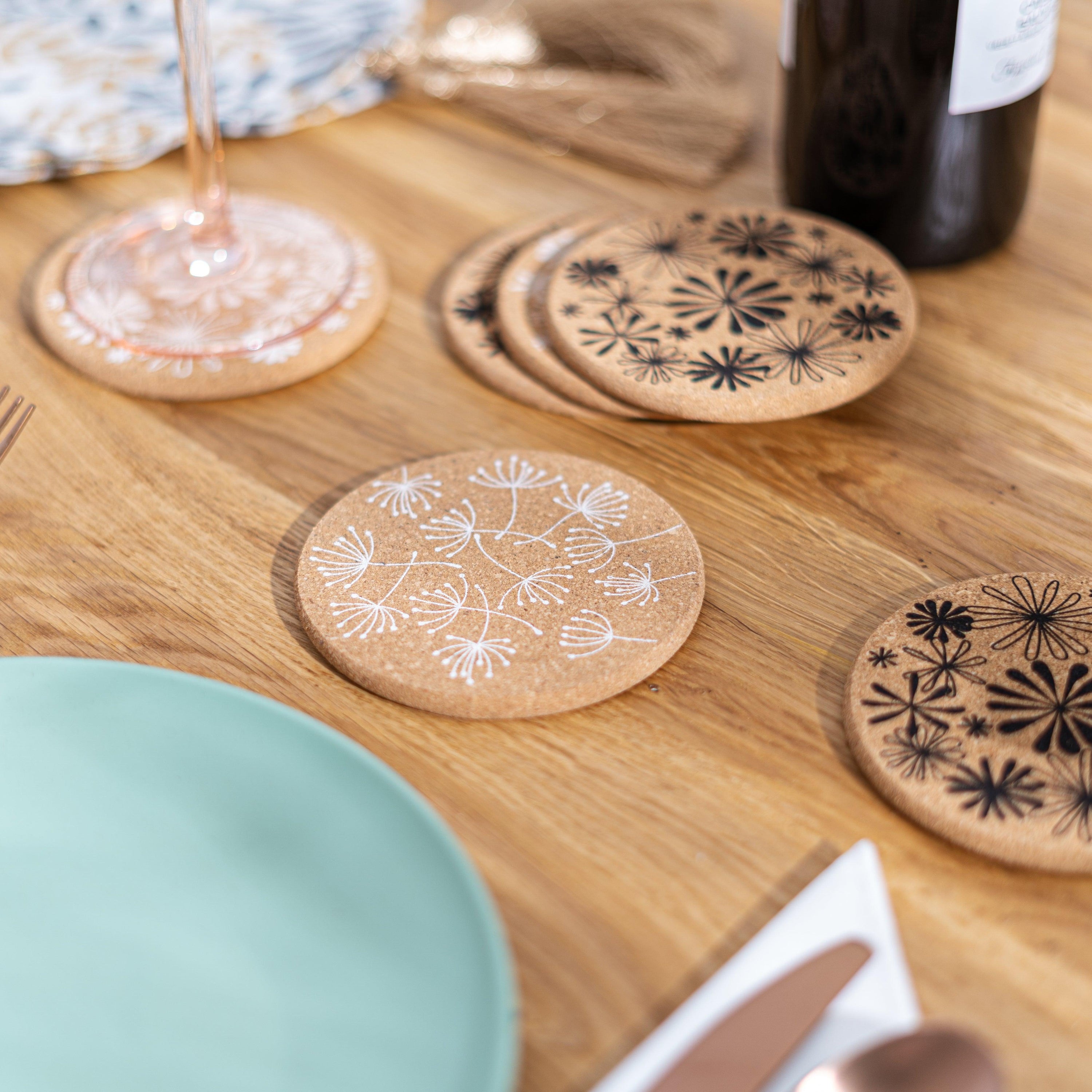 Blossom Floral Black and White Cork Coaster Set featuring six stylish coasters with floral designs, perfect for home decor and gifts.