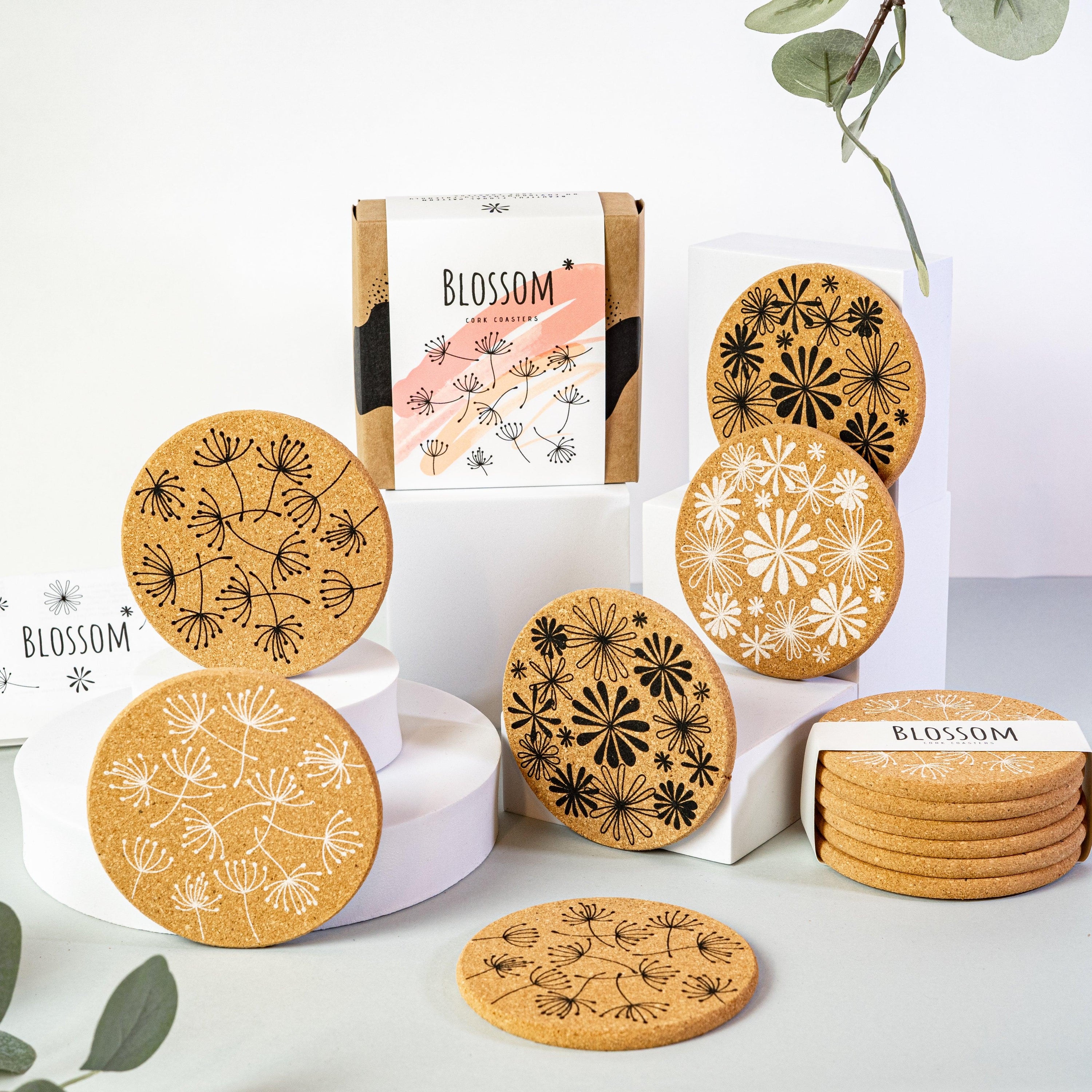Blossom Floral Black and White Cork Coaster Set featuring six stylish coasters with floral designs, perfect for home decor and gifts.