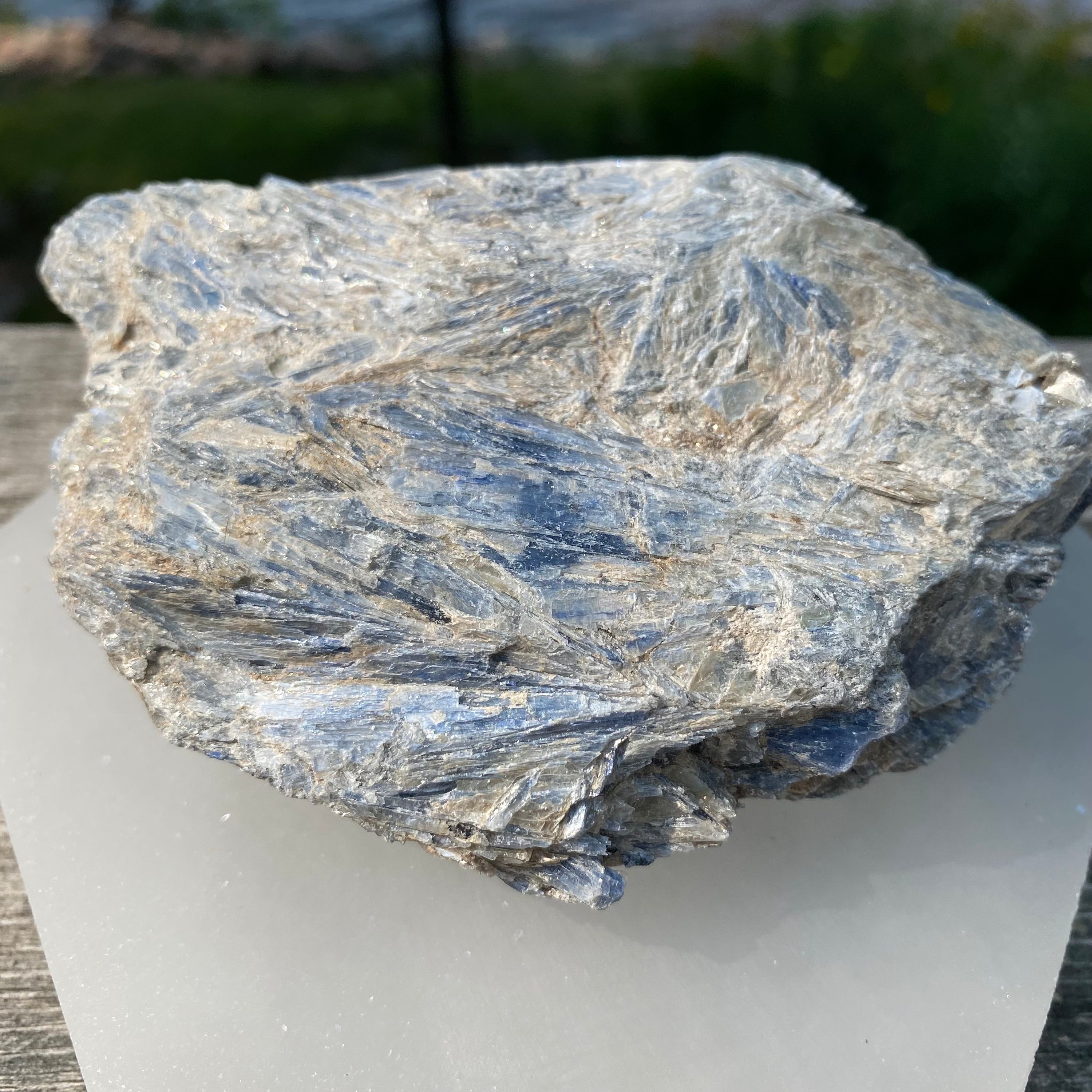 A beautiful light blue Kyanite cluster with Mica inclusions, showcasing its unique natural formations.