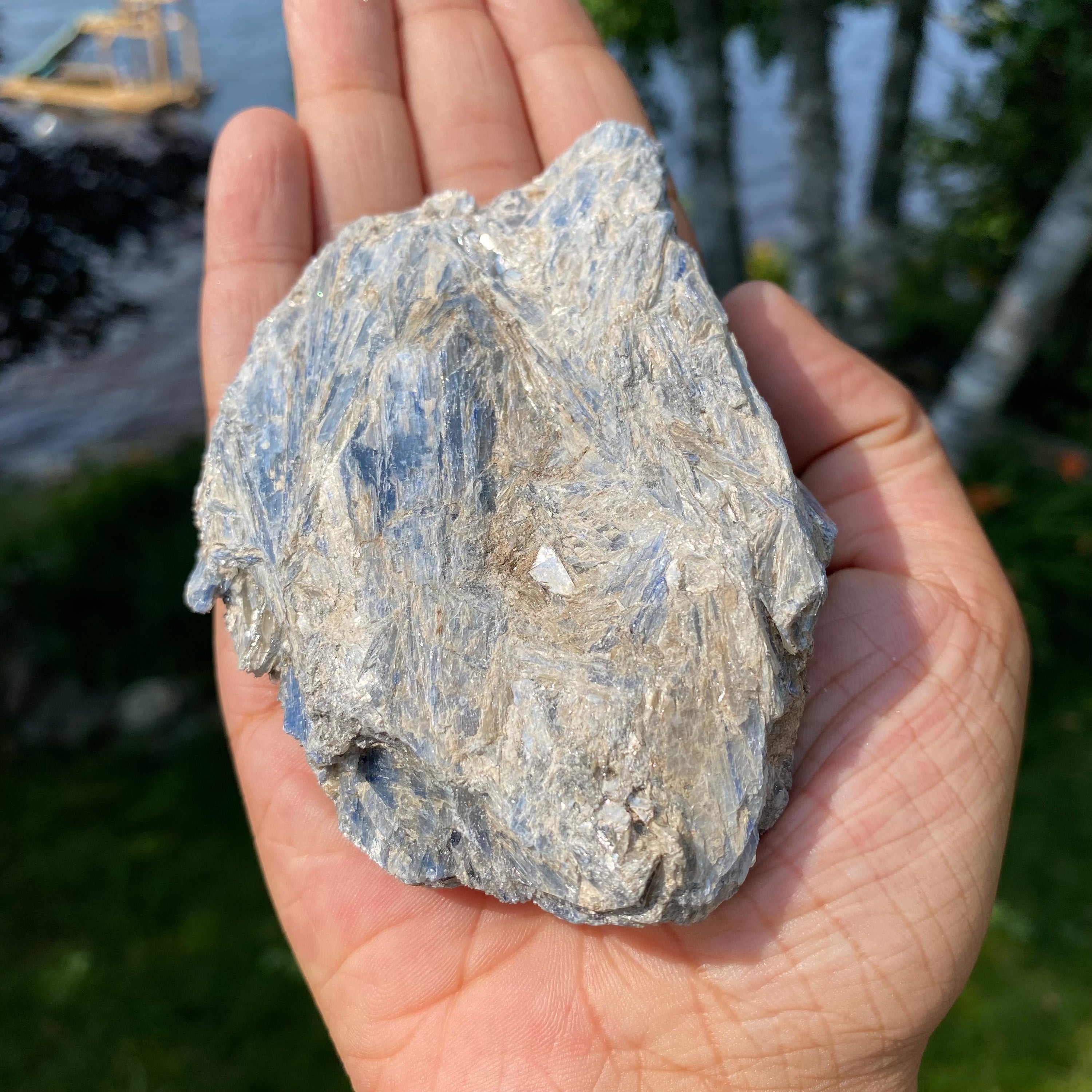 A beautiful light blue Kyanite cluster with Mica inclusions, showcasing its unique natural formations.