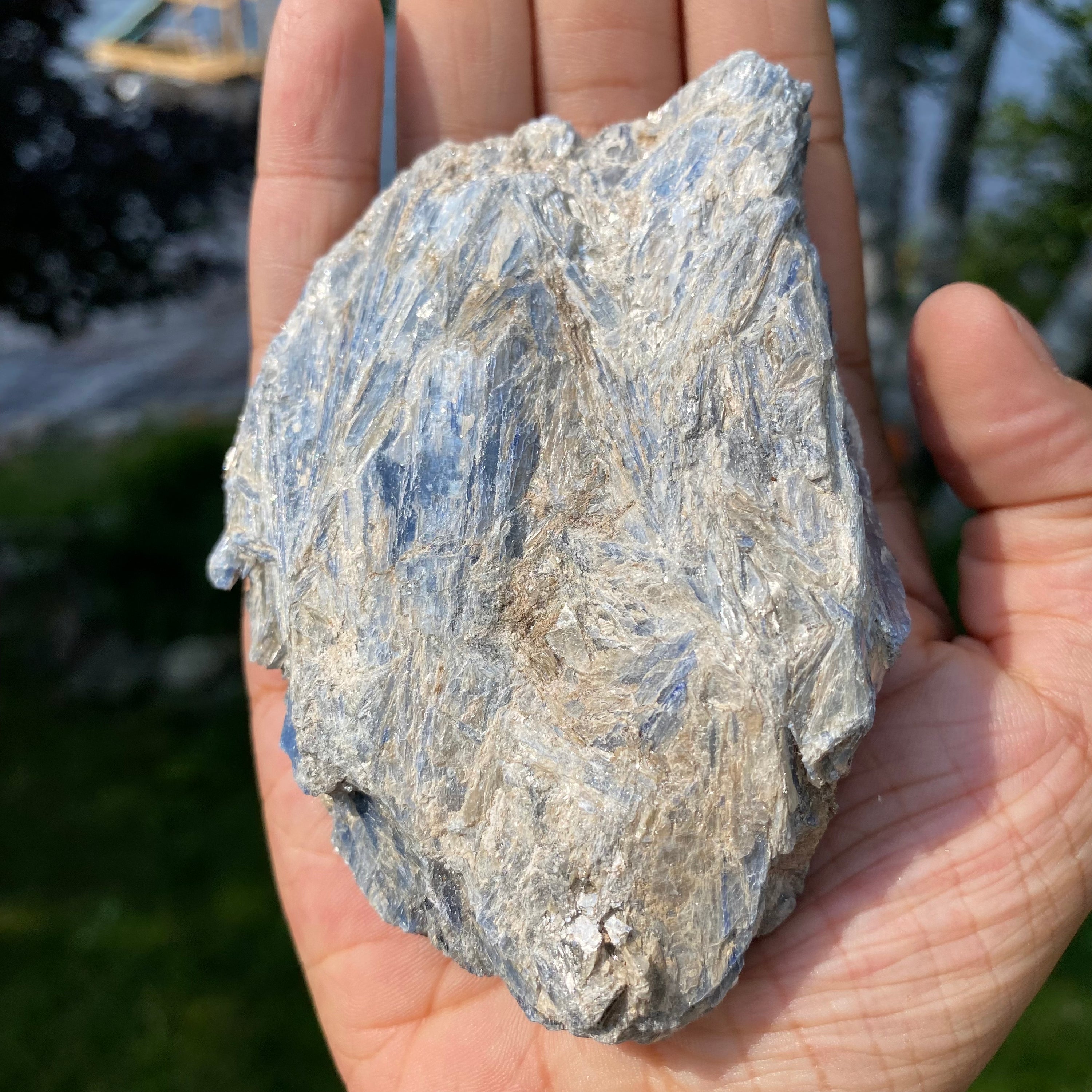 A beautiful light blue Kyanite cluster with Mica inclusions, showcasing its unique natural formations.