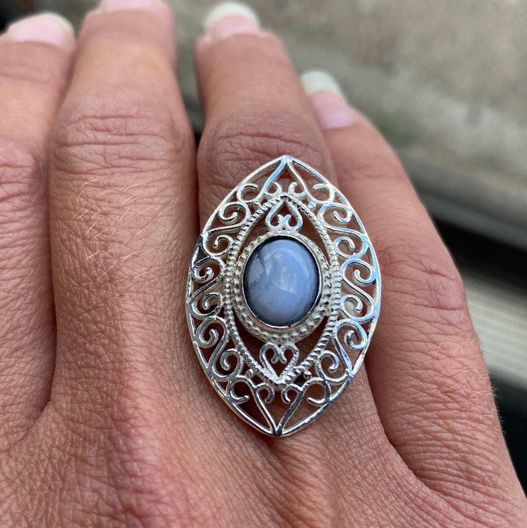 A beautiful Blue Lace Agate Sterling Silver Ring, size 7.25, showcasing a delicate blue lace agate stone set in polished sterling silver.