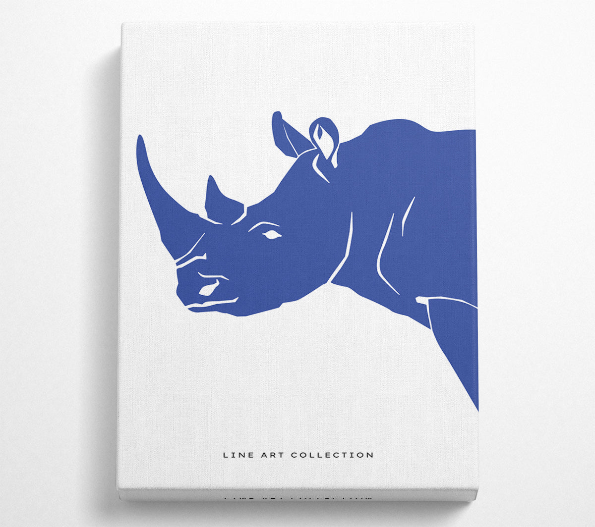 A vibrant Blue Rhino artwork printed on coated polyester canvas, mounted on a sturdy 44mm box frame, ready to hang.
