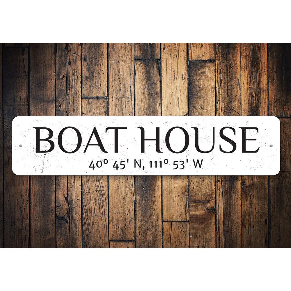 A beautifully crafted Boat House Latitude Longitude Sign made of durable aluminum, showcasing customizable text for lakehouse decor.
