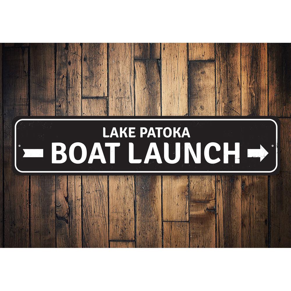 Boat Launch Arrow Sign made of durable aluminum, featuring customizable text and pre-drilled holes for easy mounting, perfect for lakehouse decor.