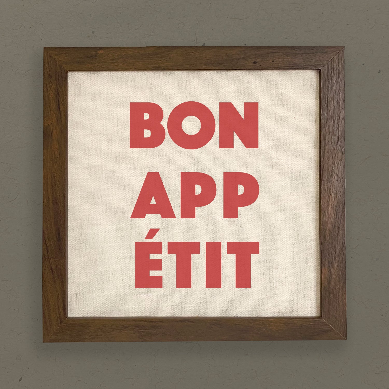 Bon Appetit framed sign with a stylized wood frame, featuring a linen-look background and eco-friendly ink printing.