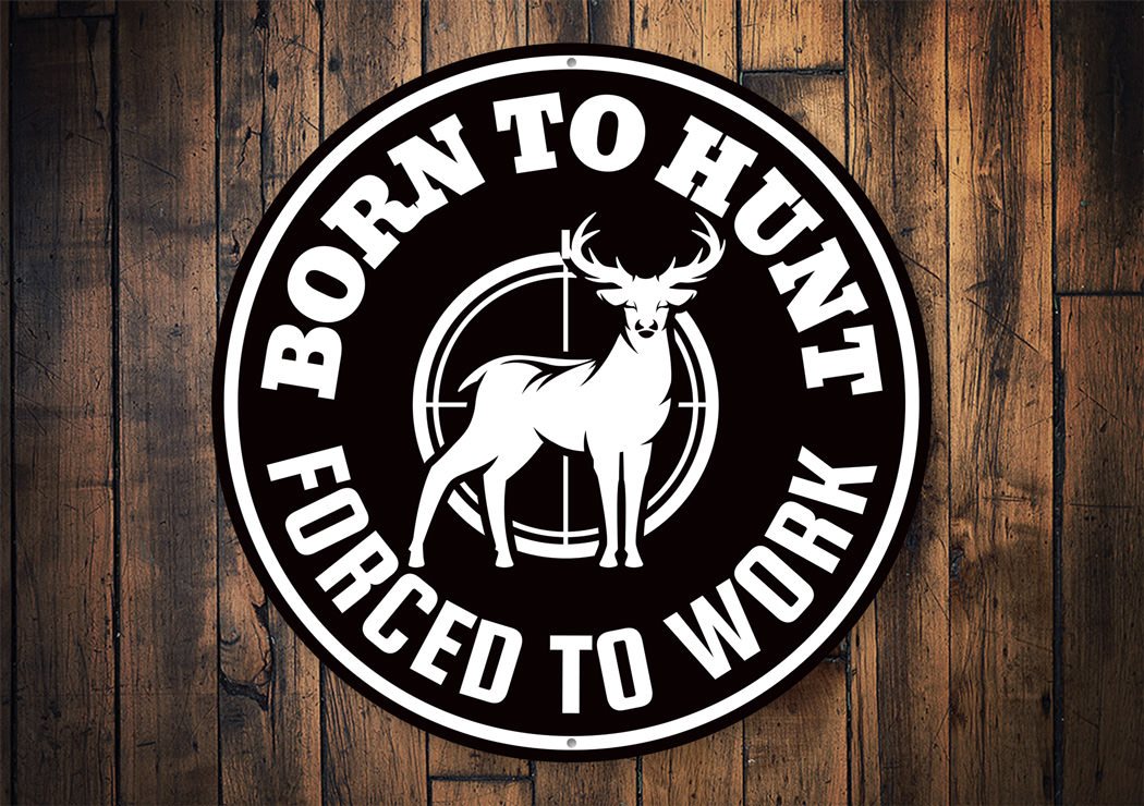 A humorous metal sign reading 'Born to Hunt, Forced to Work', showcasing a rustic design suitable for cabin decor.