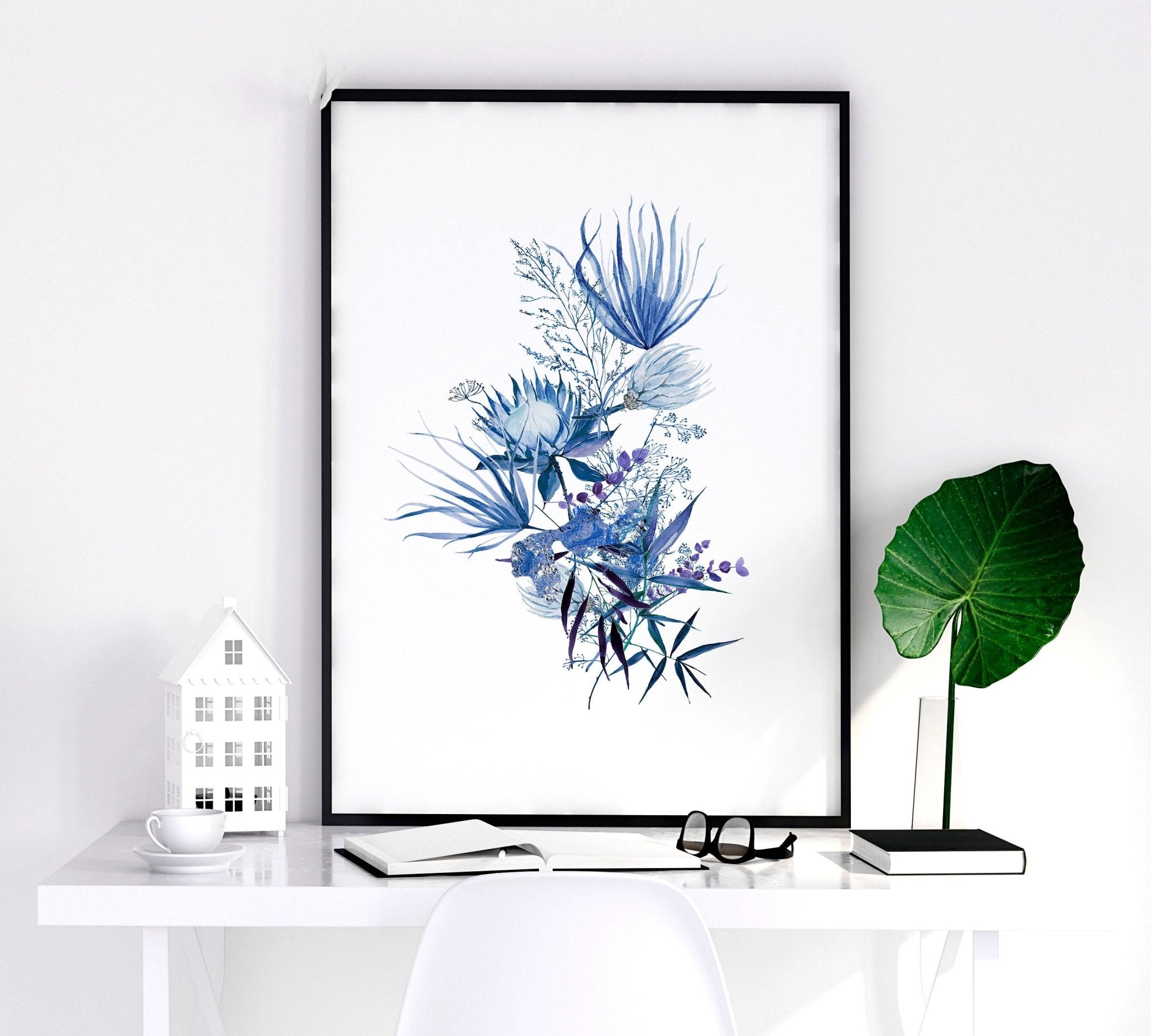 Set of 3 framed Botanical prints featuring intricate blue watercolor illustrations, perfect for home decor.