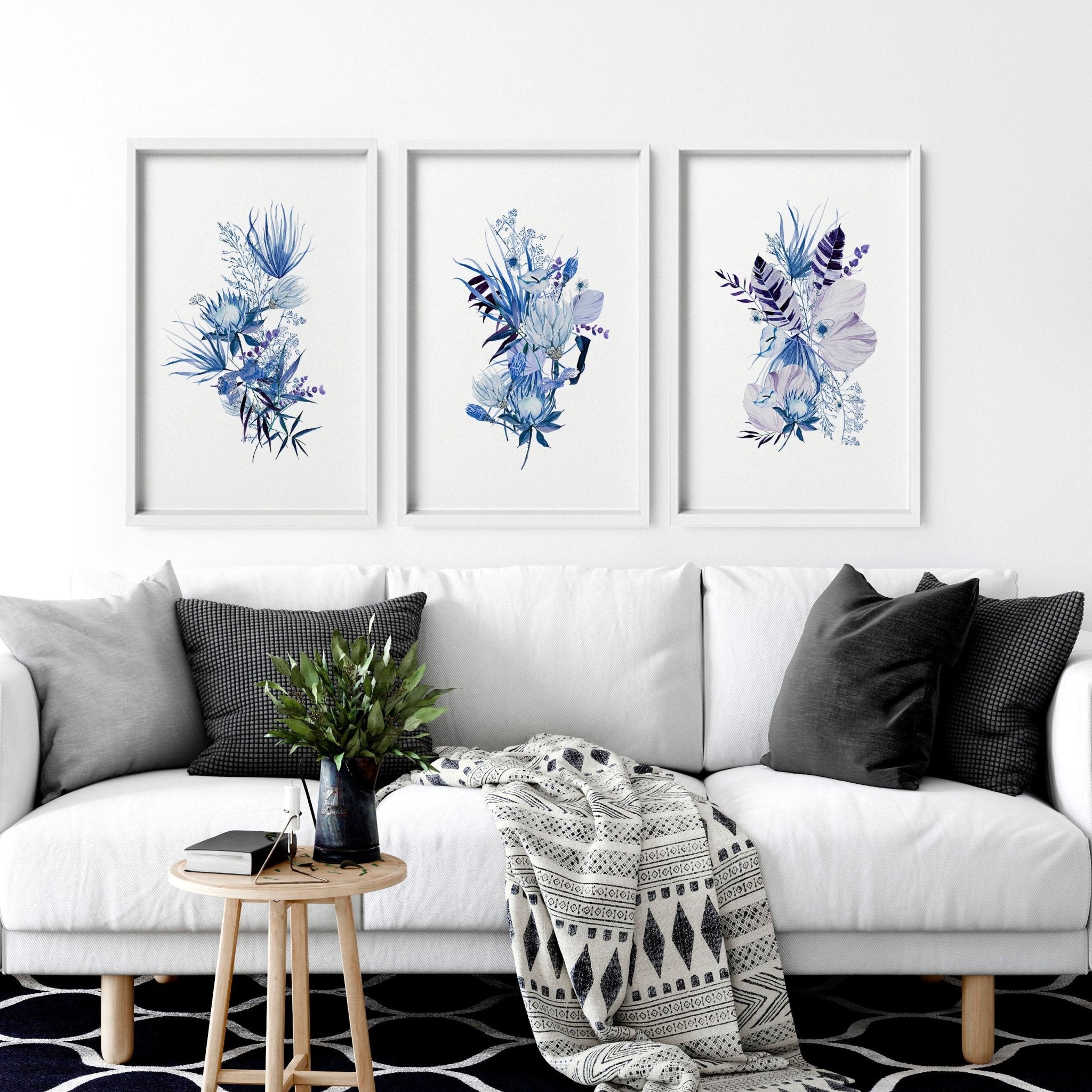 Set of 3 framed Botanical prints featuring intricate blue watercolor illustrations, perfect for home decor.