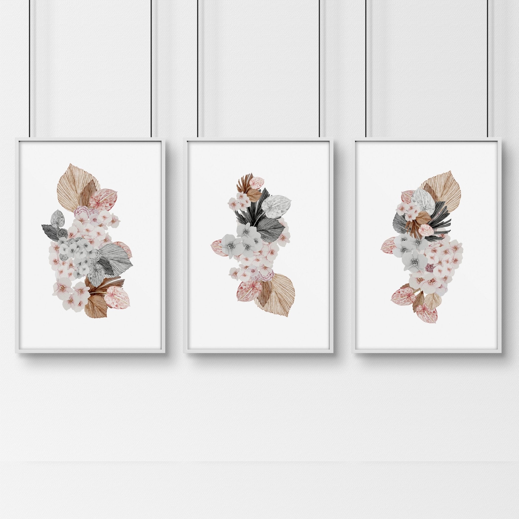 Set of 3 botanical wall art prints featuring delicate flowers in soft pink and grey shades, perfect for home decor.