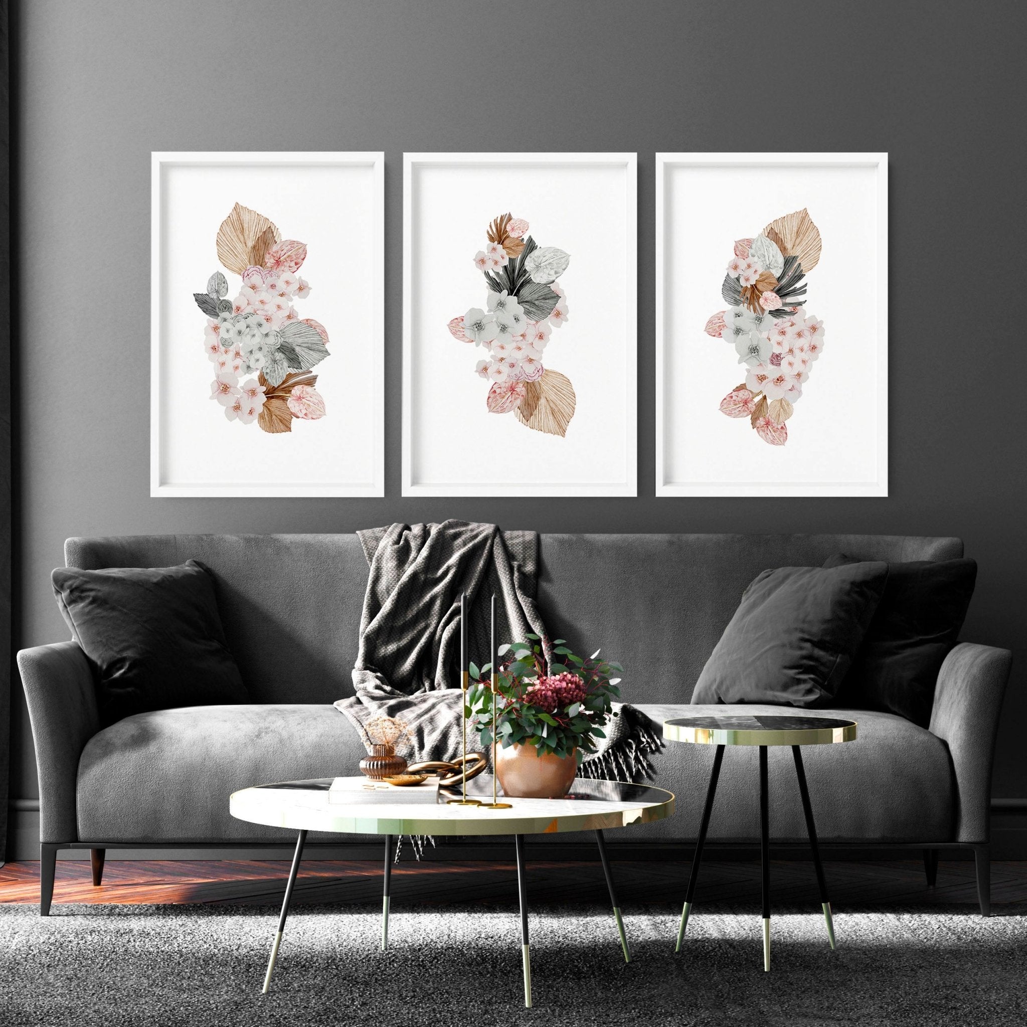 Set of 3 botanical wall art prints featuring delicate flowers in soft pink and grey shades, perfect for home decor.