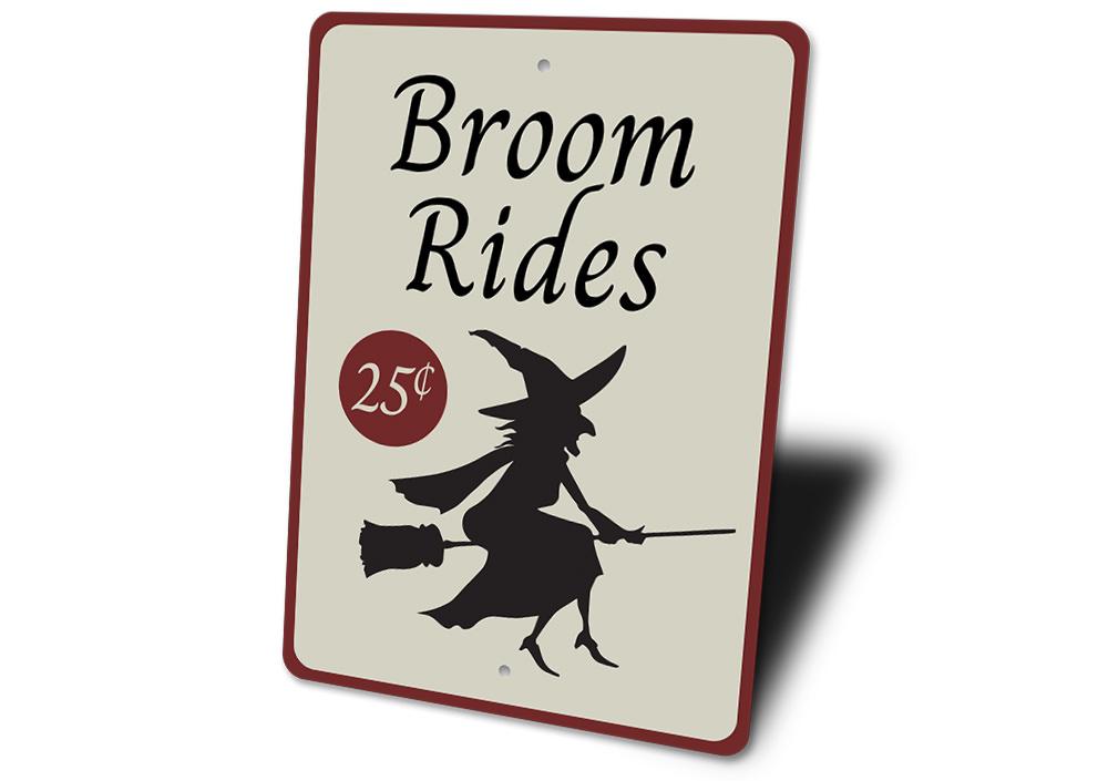 A decorative Broom Rides Sign made of high-quality aluminum, featuring spooky Halloween-themed graphics, perfect for indoor or outdoor display.
