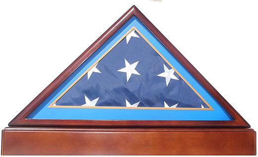 Air Force Burial Flag Display Case Frame with Pedestal Stand, crafted from solid wood, showcasing a folded U.S.A flag.