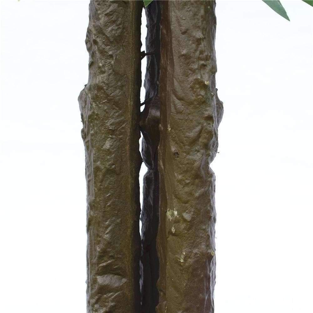 A 140cm tall bushy artificial ficus tree with a dark trunk, featuring lush green foliage, perfect for indoor decoration.