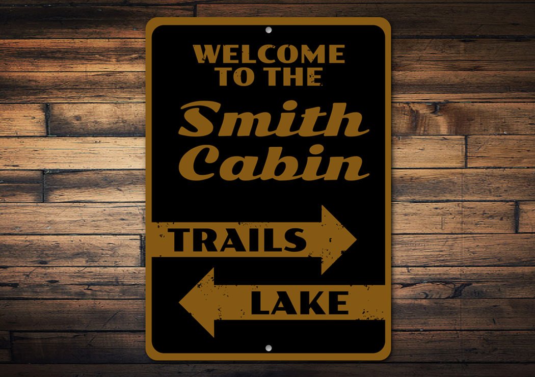 A beautifully crafted Cabin Welcome Sign made of aluminum, featuring customizable text, perfect for lakehouse decor.