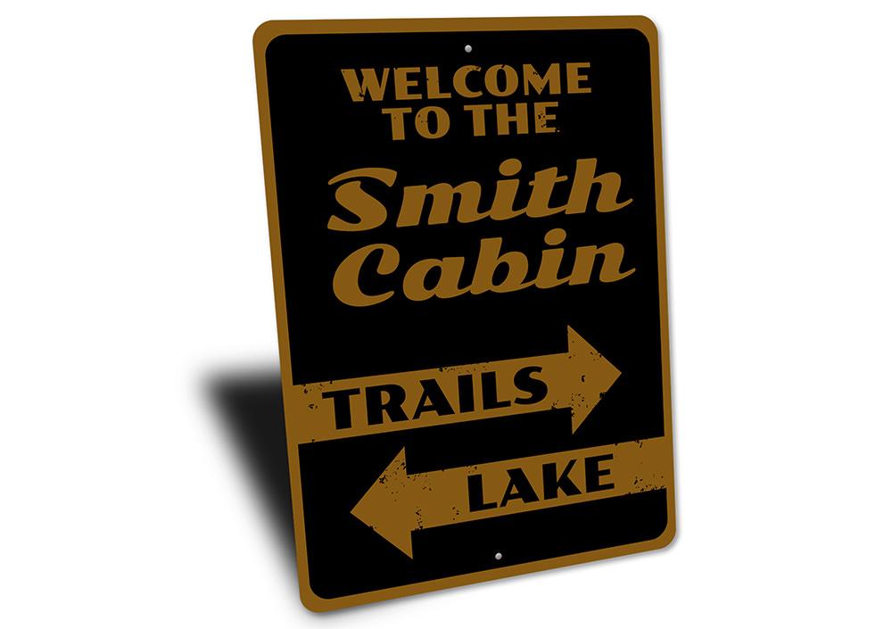 A beautifully crafted Cabin Welcome Sign made of aluminum, featuring customizable text, perfect for lakehouse decor.