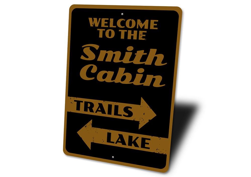 A beautifully crafted Cabin Welcome Sign made of aluminum, featuring customizable text, perfect for lakehouse decor.