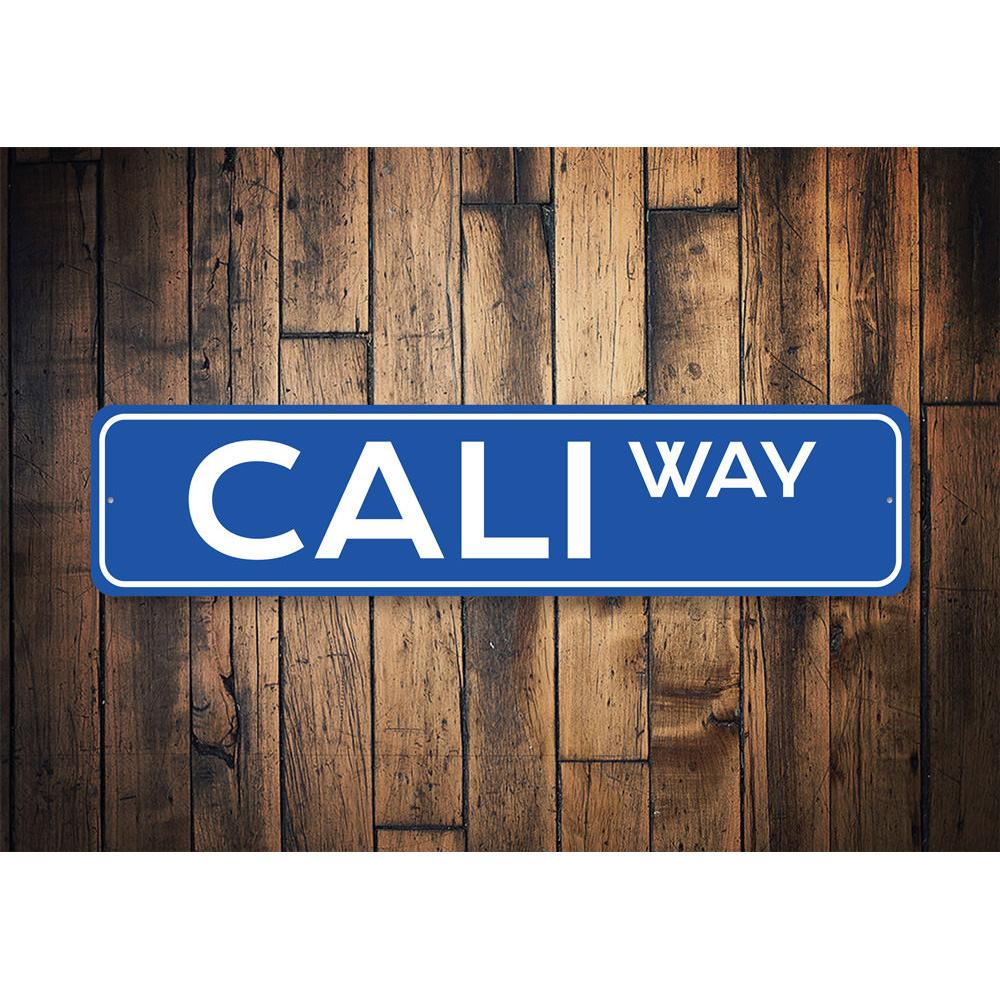 Cali Way Street Sign made of high-quality aluminum, featuring customizable text and pre-drilled holes for easy mounting.