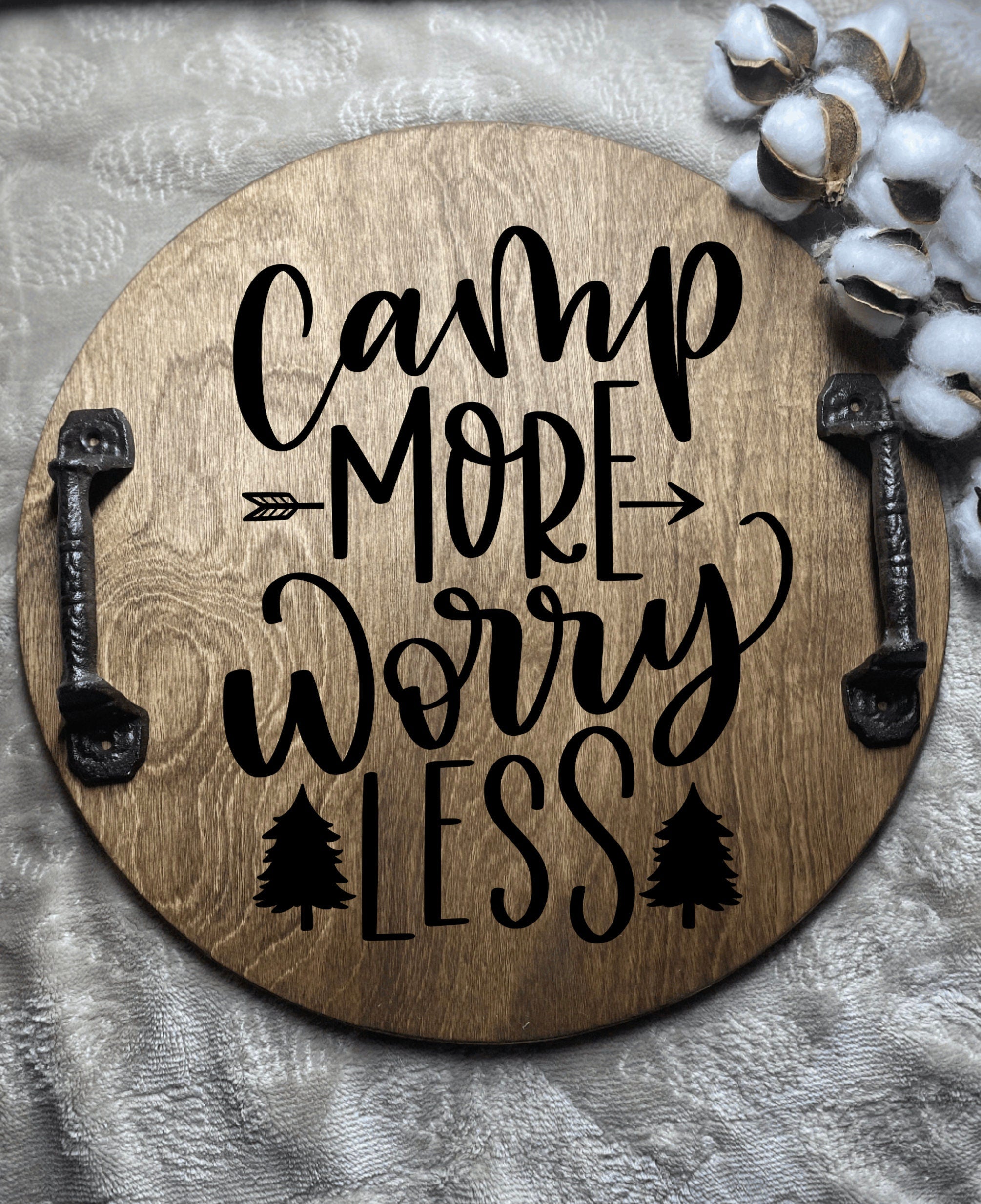 Handmade rustic wood tray with black metal handles, showcasing a rich dark chestnut finish and unique burned sentiment.