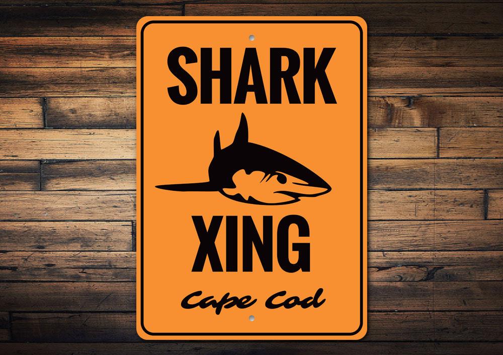 Cape Cod Shark Crossing Sign made of durable aluminum, featuring a playful shark design, perfect for coastal decor.