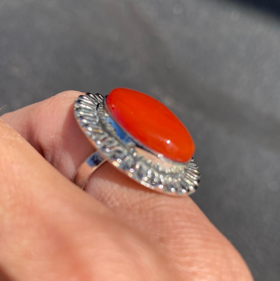 A beautiful Carnelian Sterling Silver Ring, size 6, showcasing a vibrant orange-red stone set in durable sterling silver.