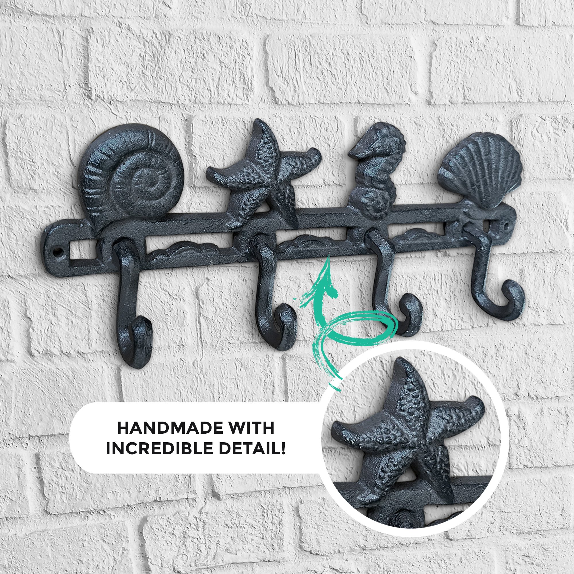 A pair of 13-inch cast iron seashell wall hooks, showcasing intricate detailing and a rustic finish, perfect for beach-themed decor.